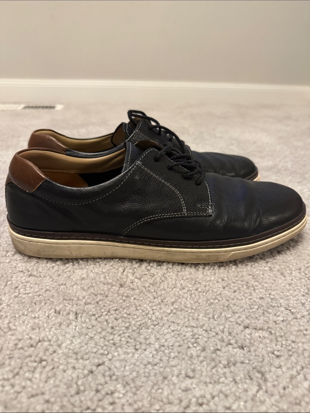 Johnston & Murphy Black Leather Derby with Brown Heel Accent